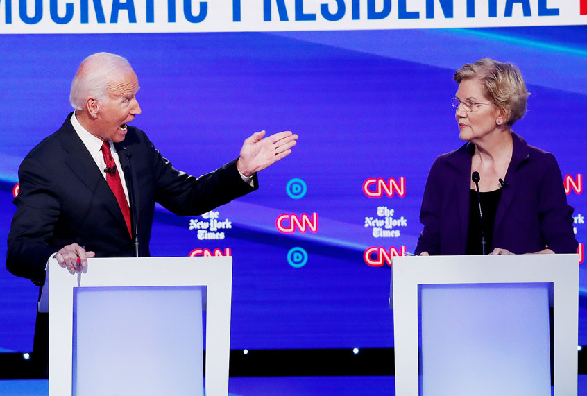 Democratic presidential candidate former Vice President Joe Biden, left, and Sen. Elizabeth Warren, D-Mass., participate in a Democratic presidential primary debate hosted by CNN/New York Times at Otterbein University, Tuesday, Oct. 15, 2019, in Westerville, Ohio. (AP Photo/John Minchillo)