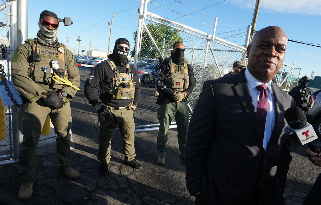 Mayor Ras Baraka of Newark speaks to the press near ICE agents at a demonstration outside an immigrant detention centre in Elizabeth, New Jersey May 7, 2025. (Getty Images/Timothy A. Clary)
